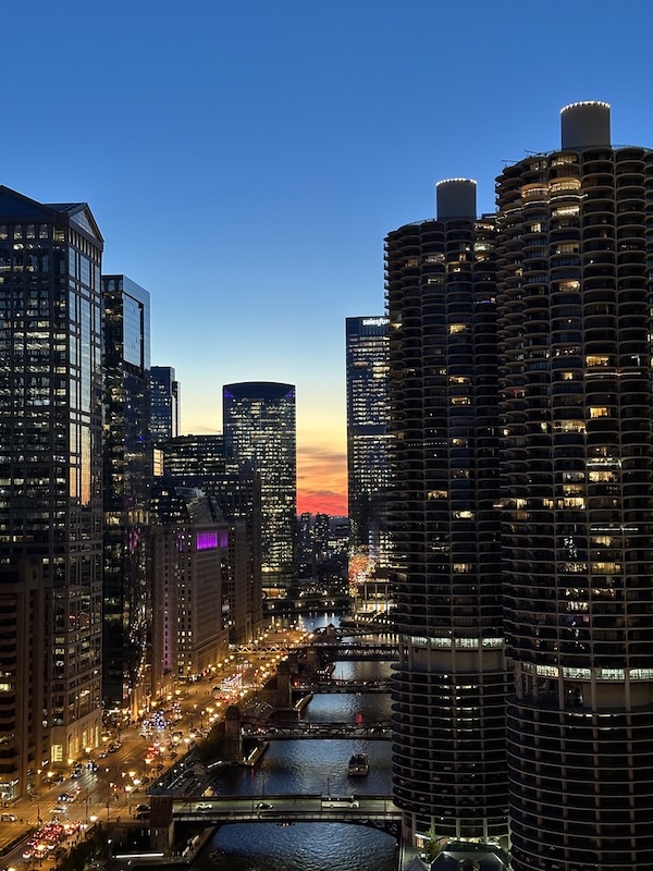 Chicago skyline at sunset viewed from a rooftop